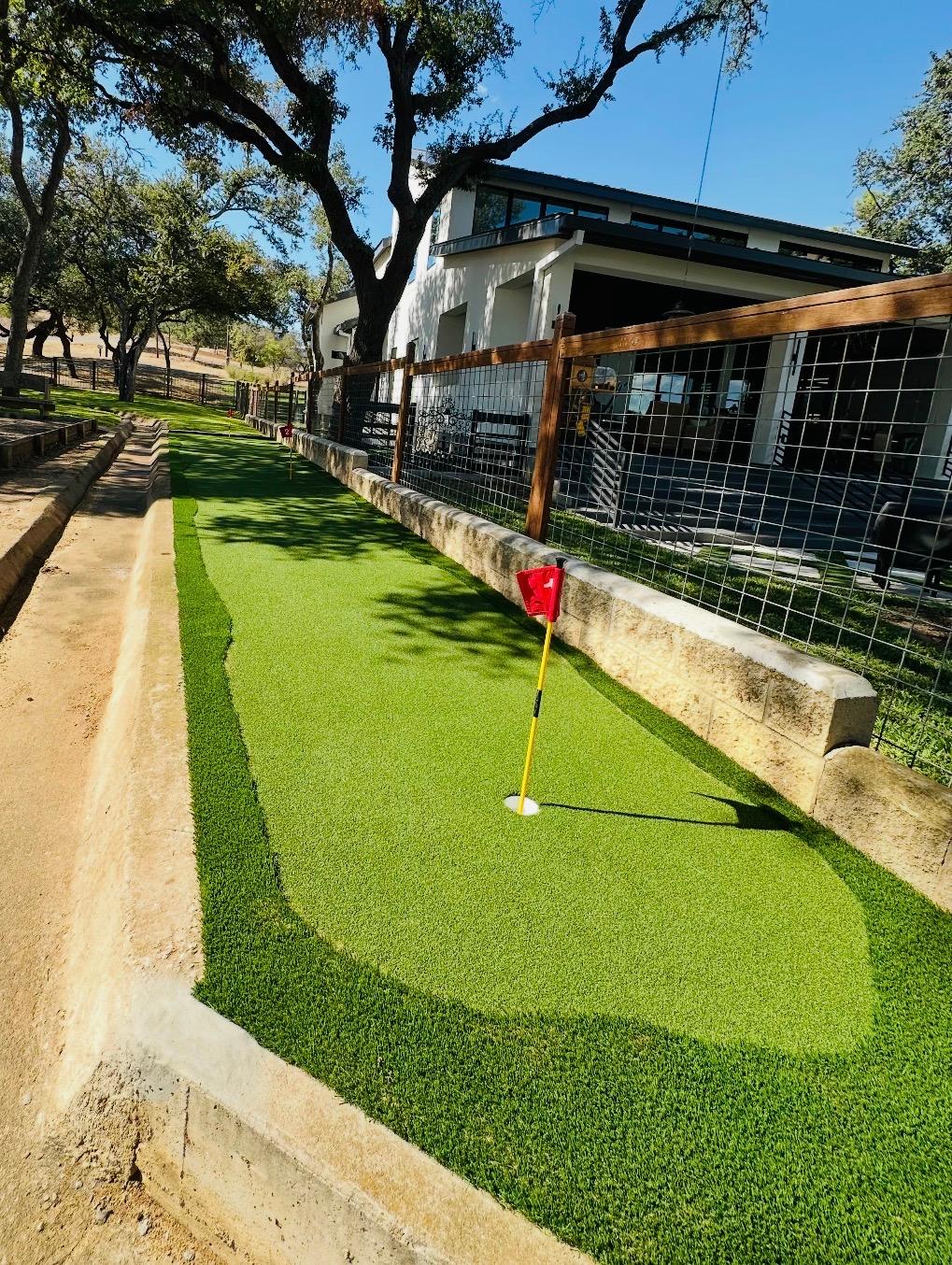 Custom artificial turf putting green and chipping station